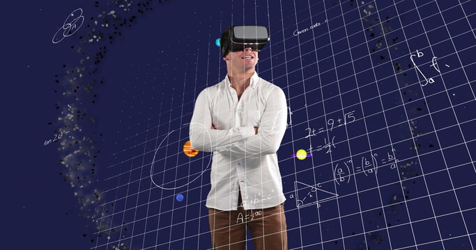 Image of businessman wearing vr headset over equations and solar system