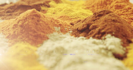 Image of light spots over colourful powder