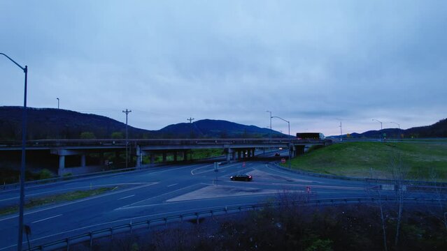 Conestoga Semi Truck on Interstate Overpass. Milesburg, Pennsylvania, USA.