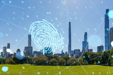 New York city skyline with a fingerprint hologram overlay. Modern cityscape and technology concept. Double exposure