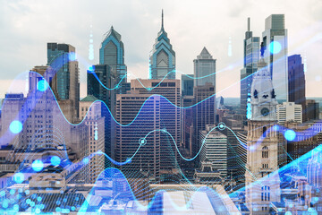 Philadelphia skyline with futuristic blue holographic overlay. Double exposure