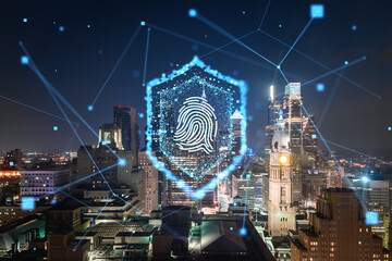 Night cityscape with a hologram fingerprint over the Philadelphia skyline, technology and security...