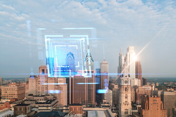 Philadelphia skyline with a digital hologram overlay, cityscape background, and light flare. Double...