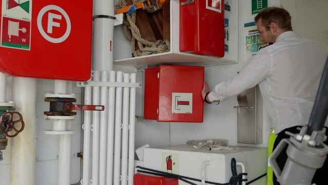 Ship Captain inspect the international shore connection for fire fighting