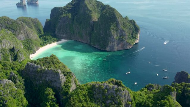 Tropical Island Tourist Destination, Maya Bay, Ko Phi Phi Le Island - Krabi Province Thailand. Stunning Aerial Drone View, Southeast Asia National Park. Island Hopping Boat Tour. World Famous Beach.