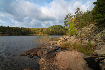 View from the shore of Lake Ladoga near the village of Lumivaara on a sunny autumn day, Ladoga skerries, Lahdenpohya, Republic of Karelia, Russia