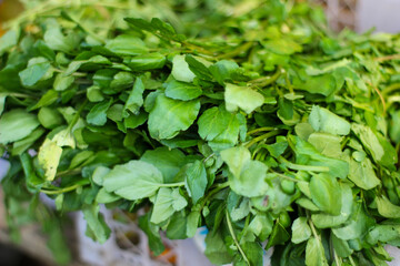 several bunches of watercress are sold in traditional markets
