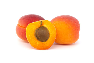 Pile of ripe apricots isolated on a white background