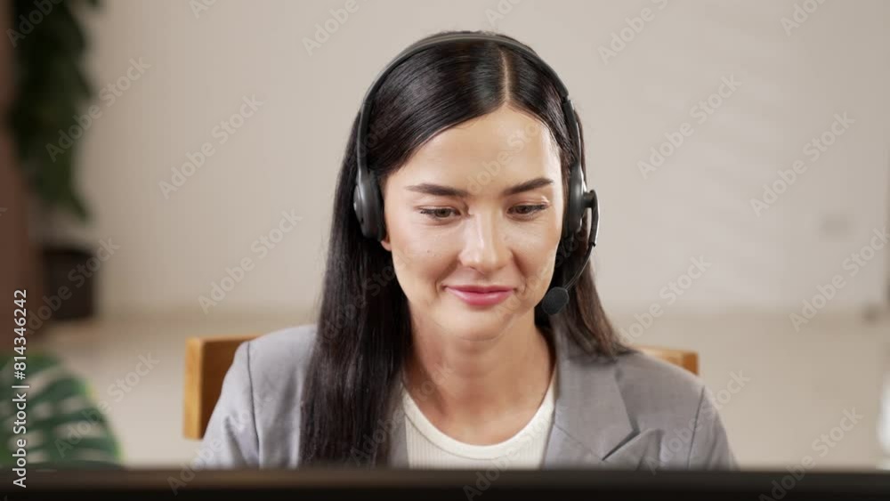 Aufkleber female call center operator or customer service helpdesk staff working on workspace while talking on