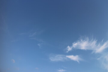 Blue sky with white clouds.