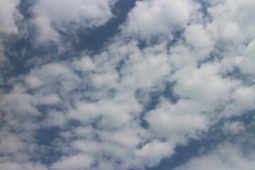 Blue sky with white clouds.