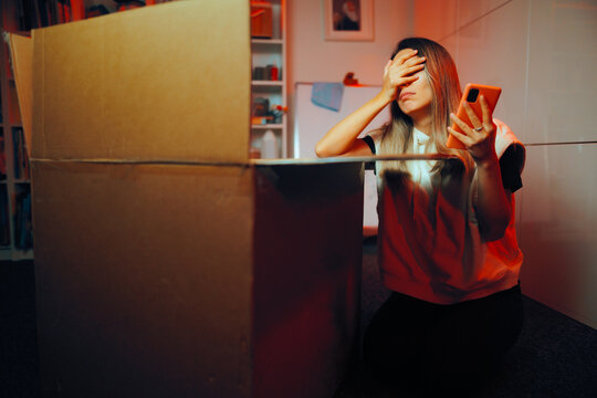Unhappy Customer Checking the Return Policy for Online Store. Unhappy customer trying to return an unwanted item
