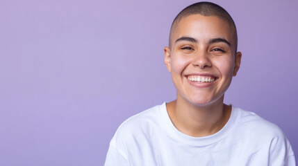 A woman with a shaved head is smiling, cancer patient with chemotherapy