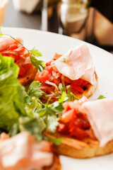 Bruschetta with tomato and ham