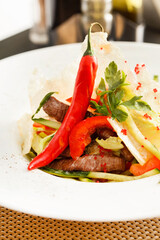 salad with meat in cafe