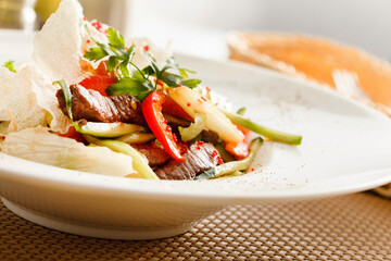 salad with meat in cafe