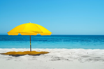 Seaside beach umbrella on a summer day