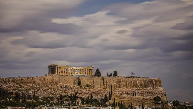 Ancient Acropolis of Athens with flowing clouds, time lapse view