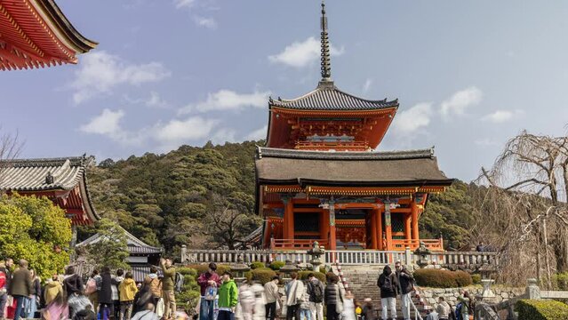 Time lapse of sacred shrine in the mountains with tourists Kyoto Japan 4K