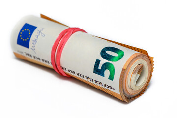 Close-up of a bundle of fifty euro bank notes bound with rubber band