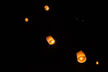 Paper chinese lanterns in night sky for Chiang Mai lantern festival