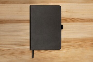 Black leather office notebook on the desk