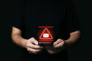 Man Holding smartphone with alert Email inbox and spam virus with warning caution for notification...