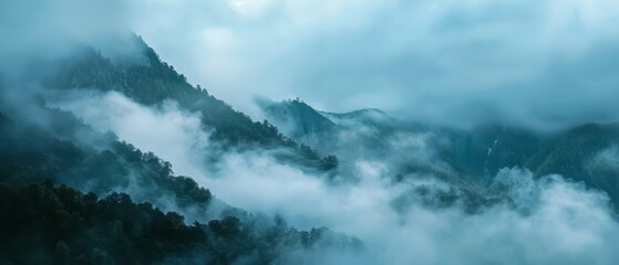Obraz premium Fog rolling over a mountain pass, creating a mysterious and obscured backdrop for moody themes,