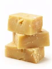 Fresh, delectable cheese sliced on a blank surface.