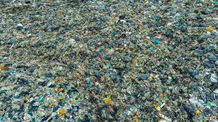 Aerial view, piles of garbage, plastic bottles and garbage. waste sorting facility Concept of waste disposal and waste separation to preserve the environment and save the world.