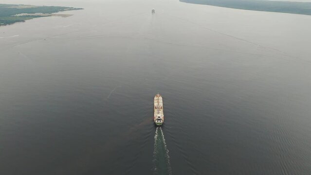 A large oil tanker sails in Paranagu&aacute; Bay, Paran&aacute; state, Brazil. 4k aerial view.