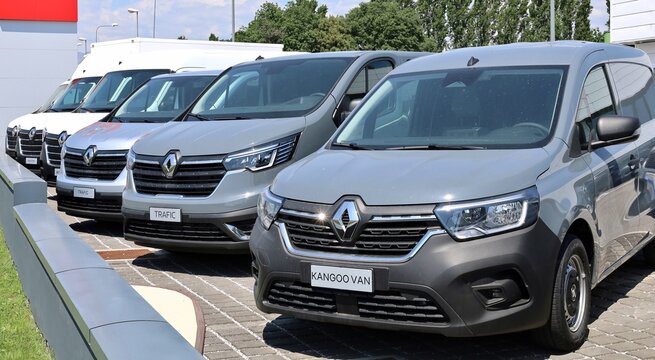 Tavagnacco, Italy. May 12, 2024 Kangoo Van, Trafic and Master, commercial vehicles of Renault automaker, lined up outside the official dealership.