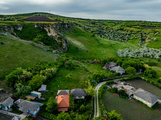 aerial view over camping with ruural moldavian houses next to duruitoarea gorge on north of moldova