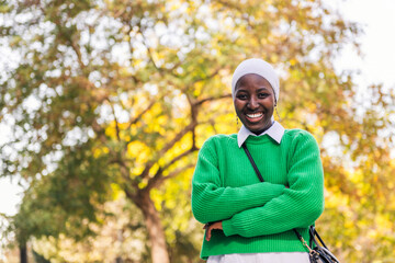 black woman laughing happy looking at camera