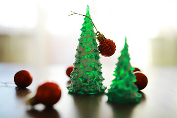 Christmas background with fir tree and decoration on dark wooden board