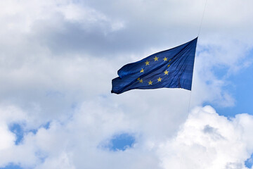 European Union Flag Against Cloudy Sky