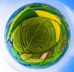 Aerial 360 VR Tiny Planet shot of Figsbury Rings. Iron age hill fort near Salisbury