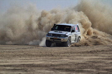 Jhal Magsi, Off road vehicle in desert © yousaf FAYYAZ