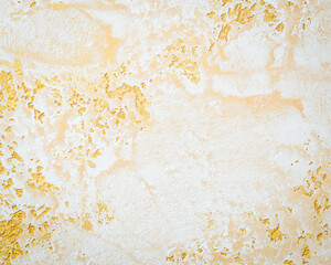 Fototapeta premium Wall decor Venetian decorative plaster with golden glitter paint. Background, abstraction.