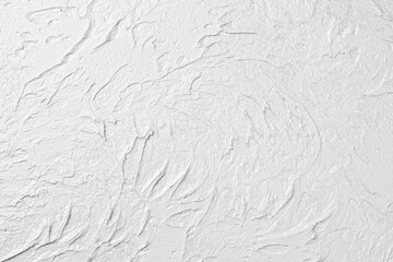 Concrete white background with stone imitation. Top view. Free space for text.
