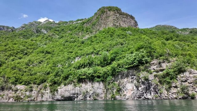 Albania shala river, Komani lake, mountain view from boat in Albania. Summer in Albania on a boat in mountain landscape  