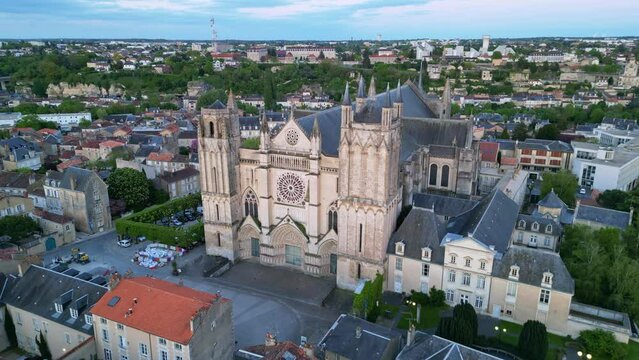 Cathedral of Saint Peter or Pierre in Poitiers city, France. Aerial drone backward