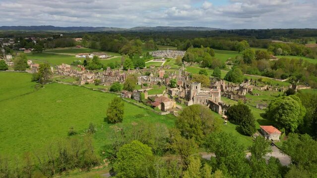 Ruins of Oradour-sur-Glane old village, Haute-Vienne department in France. Aerial drone forward