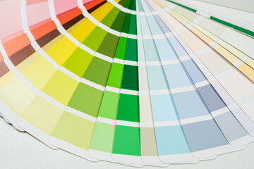 paper catalog of rainbow color isolated on grey