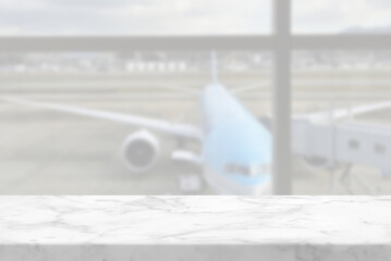 White Marble Table with Blurred Airport Window Background