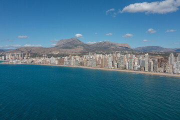 Aerial drone photo of the beautiful city of Benidorm in Spain in the summer time showing the Playa...