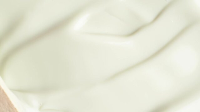 Cosmetic texture of anti-cellulite cream for body, macro shot, rotation. Skin cream texture, closeup beauty facial cosmetics mask