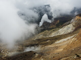 The drone view of Papandayan Mountain in Garut Regency, West Java, Indonesia. It was taken on May 14 2024 by a professional. It's an iconic mountain in this regency