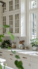 Kitchen Filled With White Cabinets