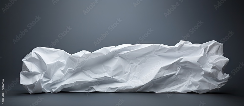 Poster A crumpled white paper with a clean and blank surface suitable for a background image with copy space